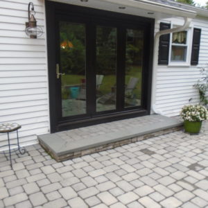 Interlocking cement pavers not only can be used as a patio surface but also can be used for steps and landings.