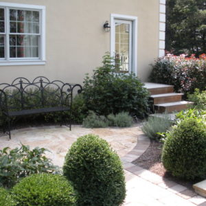 Designing areas to sit and relax are important features of a well thought out garden.