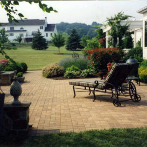 This relaxing retreat demonstrates one of the many cement paver colors and patterns available when designing patios and walkways.