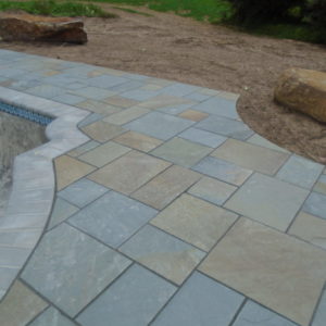 Pennsylvania bluestone offers a wide variety of textures and colors for pool patios.