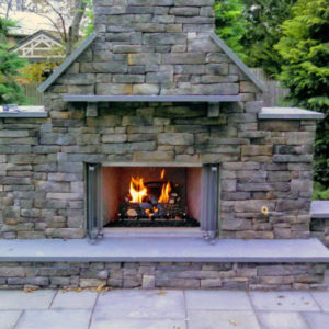 Custom stone fireplaces can be built to utilize either natural gas or wood.
