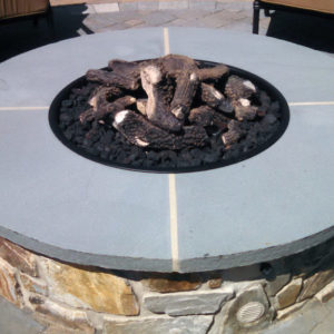 Gas firepits can be designed in many different shapes and styles to accommodate existing surroundings.